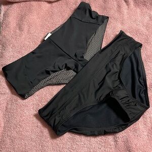Two pair of NWOT Nike black swim bottoms XL